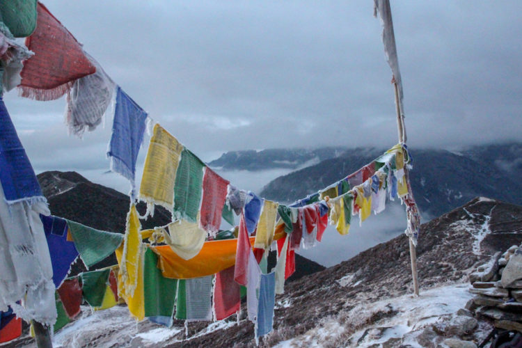 Frozen prayer flags at Dzongri viewpoint