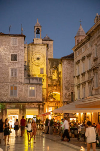 Medieval clock overlooking People's Square in Split