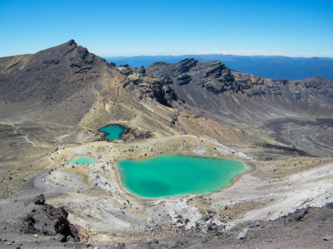 View from the Tongariro Alpine Crossing looking down at the Emerald Lakes and the surrounding otherworldly landscape