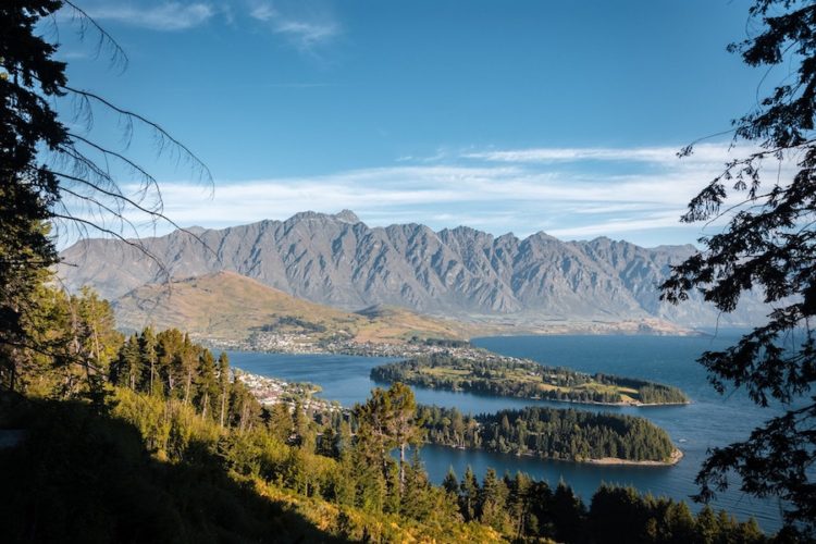 View of Queenstown and its dramatic scenery from a hiking trail in the hills above the town