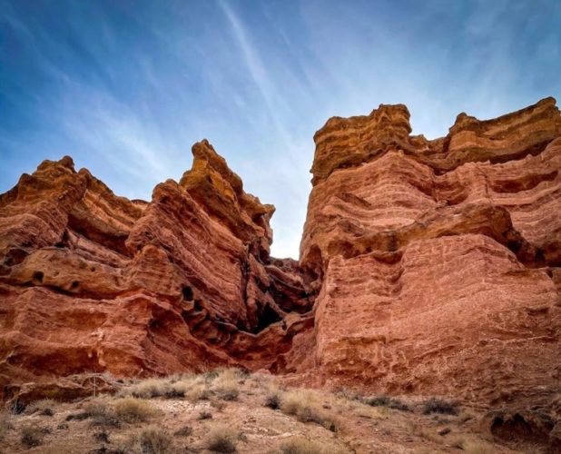 Colourful red sandstone rock formations in Charyn Canyon in Kazakhstan