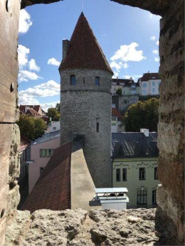 View though a stone window of a medieval tower in Tallinn