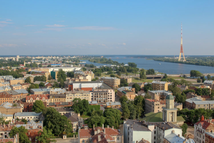 View-of-the-river-and-the-large-red-and-white-radio-tower-from-panorama-riga-observation-deck