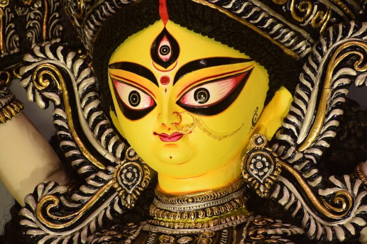 Yellow-face-of-a-Durga-puja-statue-with-three-eyes