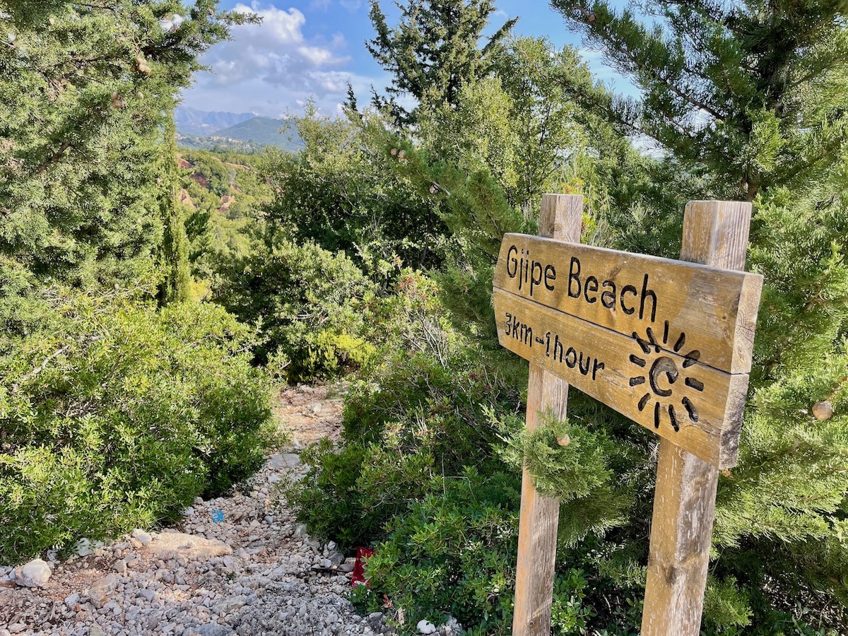 sign-showing-trail-from-road-to-gjipe-beach-near-gjipe-canyon-in-albania