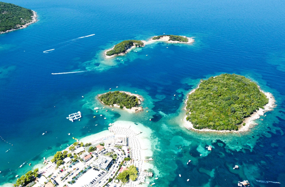 aerial-view-of-ksamil-albania-with-turquoise-water-and-beachfront-hotels