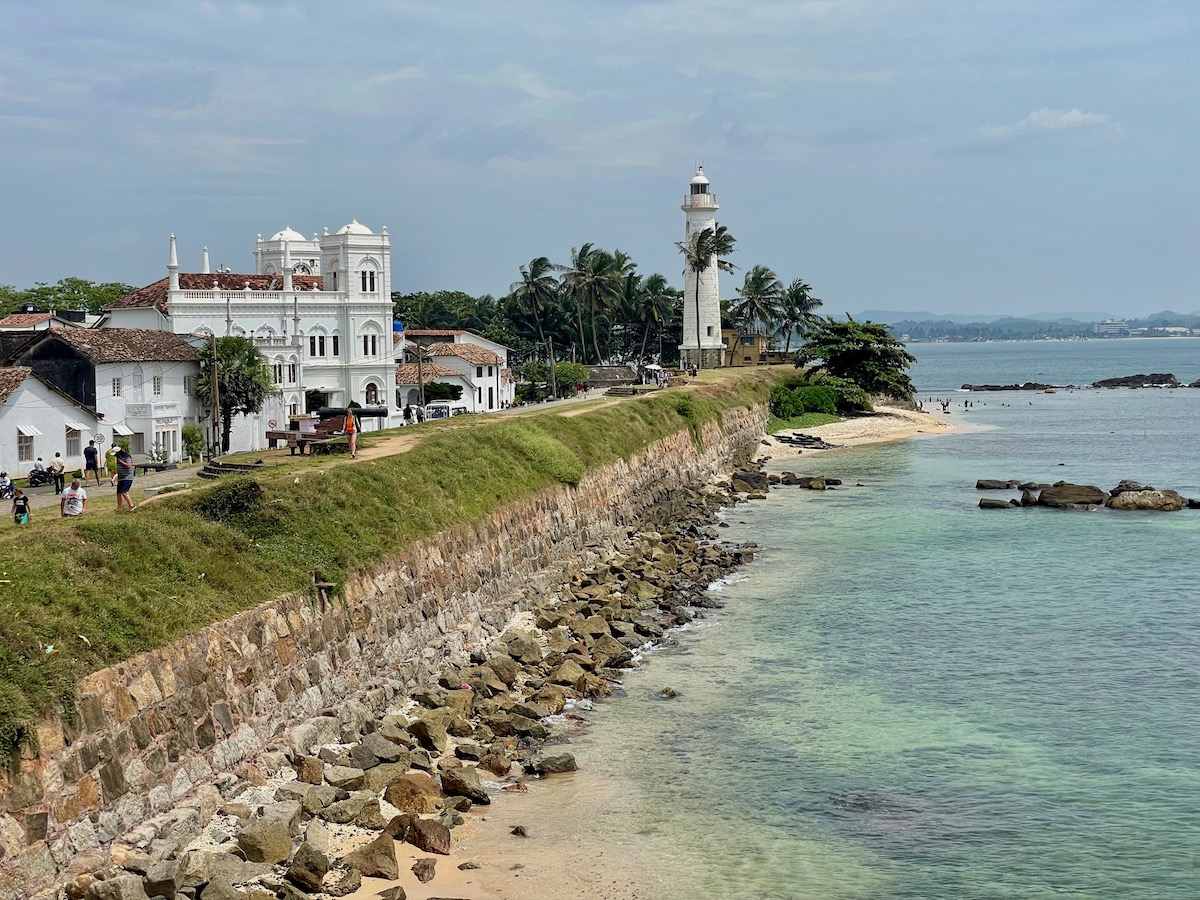 iconic view of galle lighthouse from the walls of galle fort