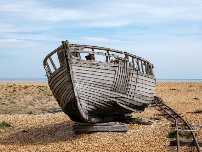 Old-ruined-boat-on-Dungeness-Beach-UK