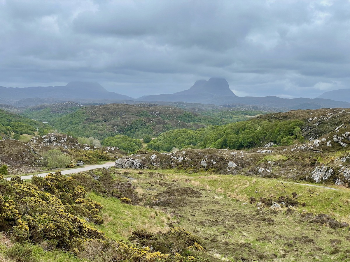Suilven mountain rising up from the sparse and wild landscape of Assynt