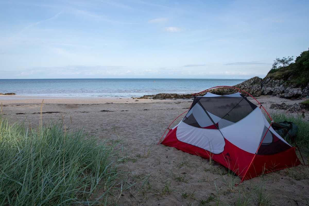 Wild camping on a remote beach at the end of Almorness Point