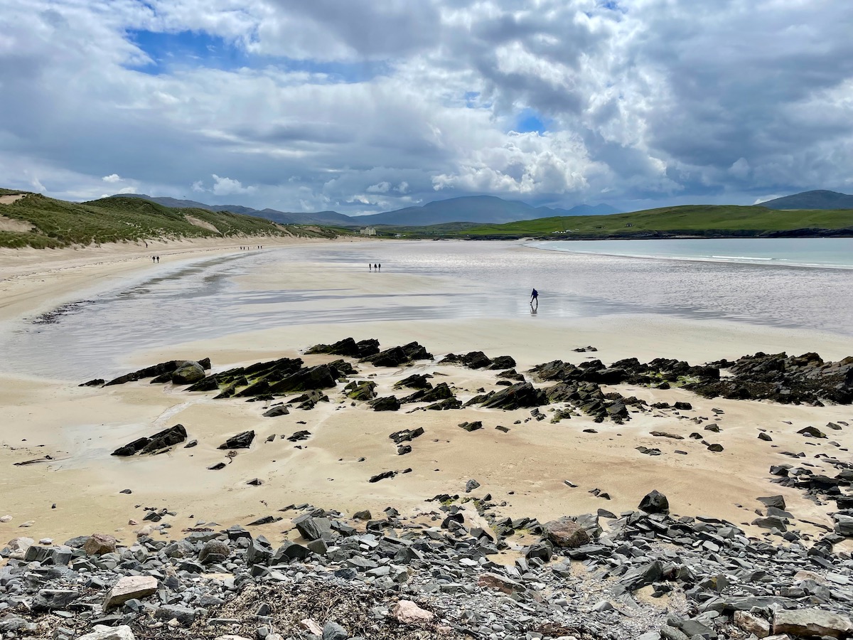 Balnakeil Beach in Scotland with vast white sands and calm shallow waters