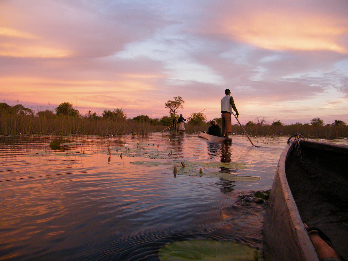 Mokoro-boat-trip-at-sunset-on-the-okavango-delta-in-Botswana