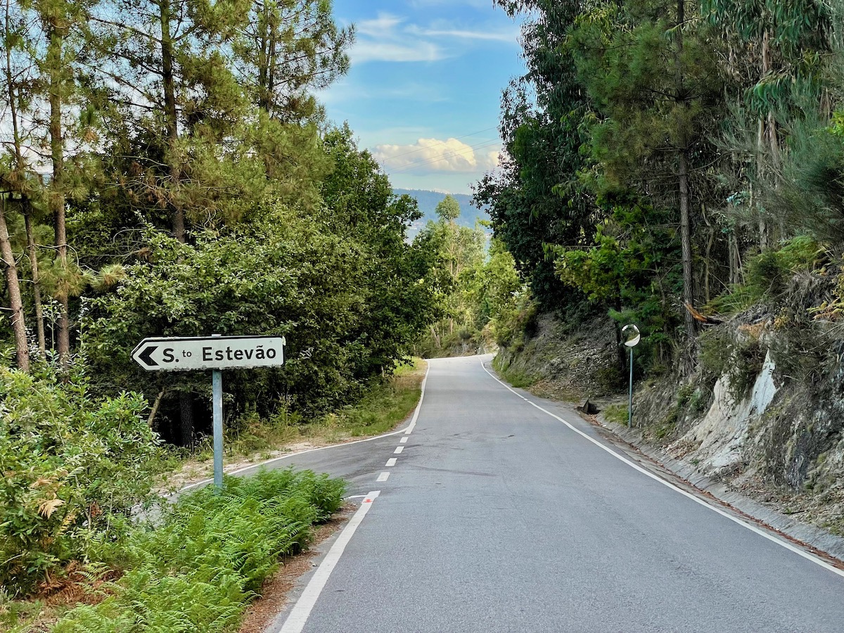 rural-road-in-northern-portugal-with-sign-to-st-estevao