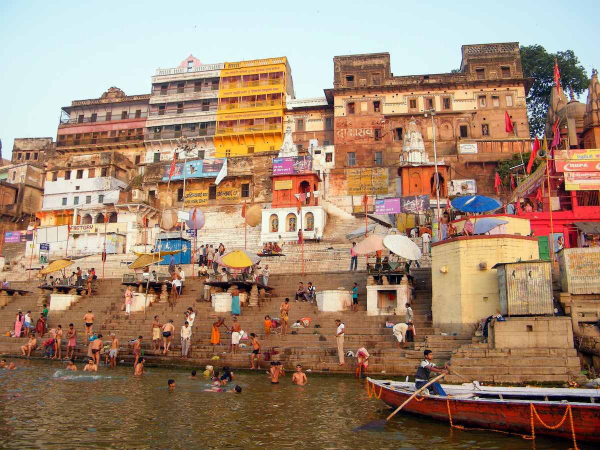 colourful buildings on the ghats next to the ganges river in varanasi