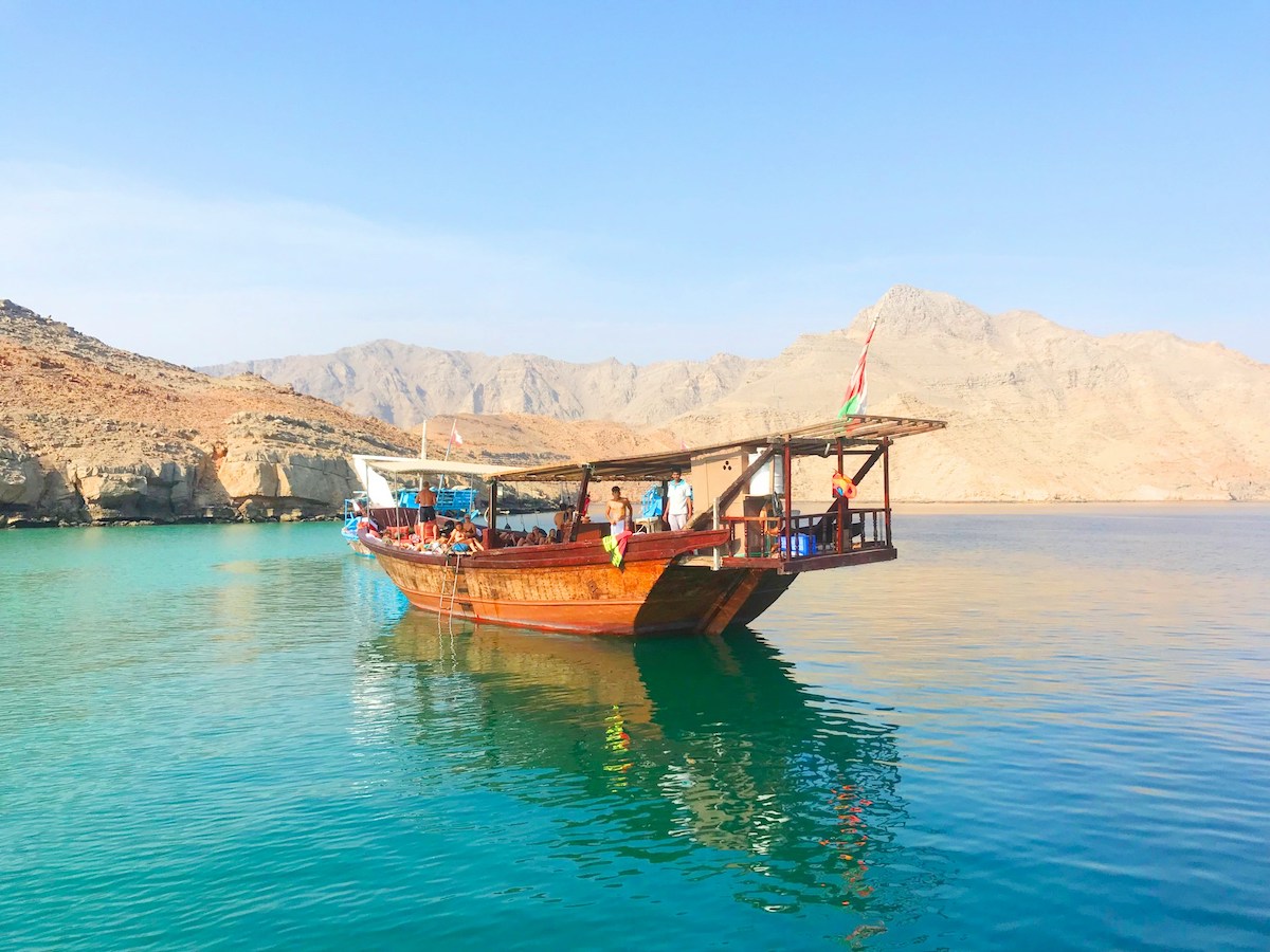 traditional wooden dhow off the coast of oman