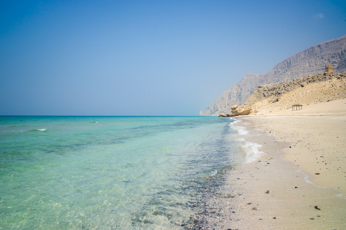 untouched omani beach with turquoise waters