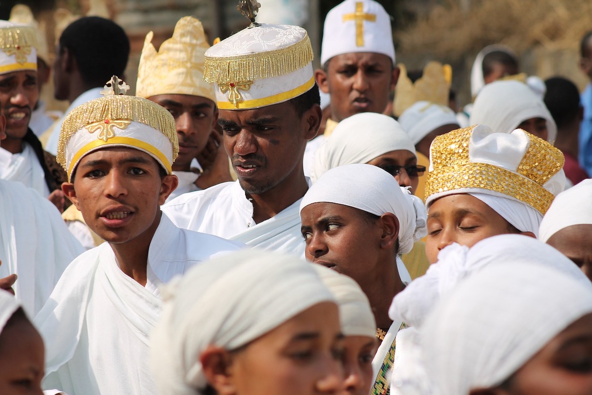 ethiopian orthodox christians dressed in white at a traditional festival celebration