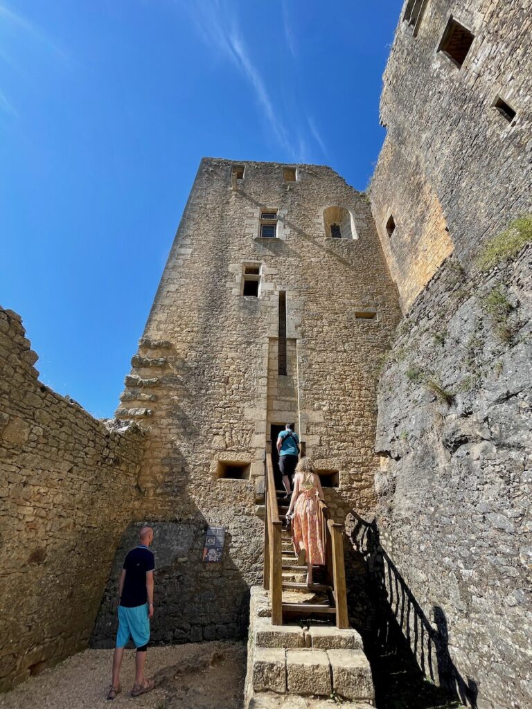 Walking up steps into the inner section of a castle